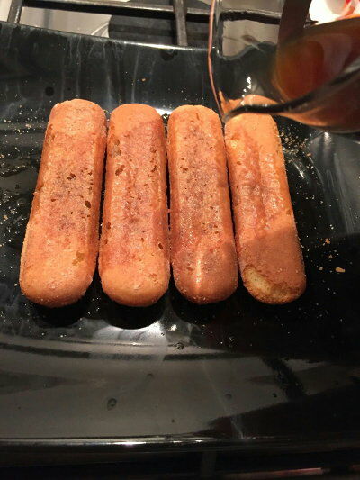 Place the ladyfingers in the dish